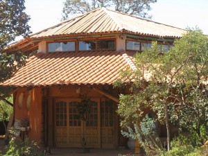 Superadobe home in Hawaii with bamboo roof