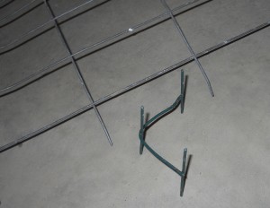 Wire mesh anchors can better secure barbed wire at corners