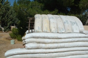 Series of photos showing how to build an earthbag vault.