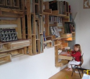 Pallet wood shelving unit with built-in desk