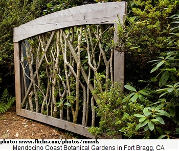 Artistic wooden garden gate at Mendocino Coast Botanical Garden