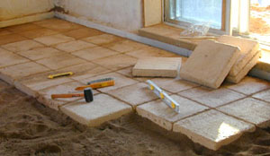 Adobe block floors are among the lowest cost, all natural, easiest to install floor options.