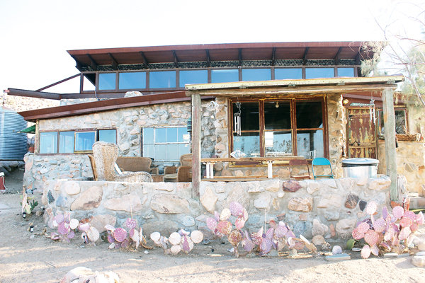 Assemblage house: Randy Polumbo's rock and glass house was built from cement, stones and reclaimed materials.