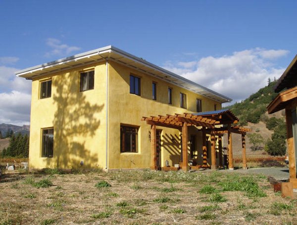 Earthbag home with traditional stucco plaster walls