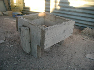 Close up view of cast in-situ adobe T-brick form.