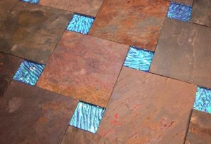 Jewel glass accent tile on slate floor