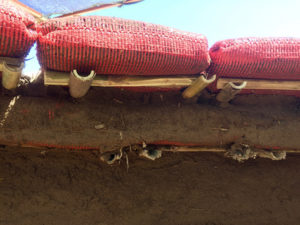 The dome shape is created by using ‘bamboo hangers’ to cantiliver each courses of earthbags.