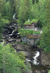 Cabin by mountain stream