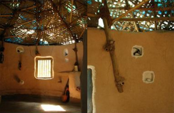 Cob house on earthbag foundation made with natural and recycled materials