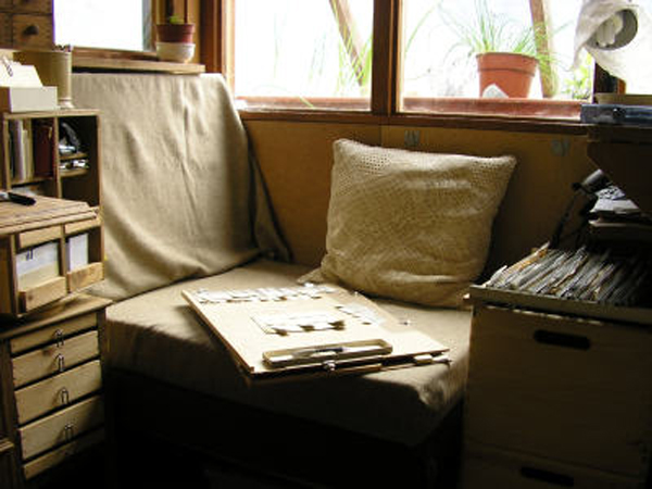The cosy seating corner/manual office. Here I have most things I need at my fingertips in the carousel and drawers.