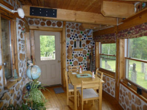 Interior view of cordwood wall sunroom.