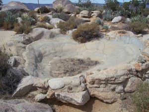 Cement coated depressions like these collect water, which is then often directed into cisterns