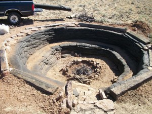 Firepit made with weed barrier fabric and tamped soil