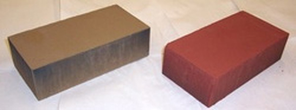 Fly ash bricks are available in various colors. Natural iron oxide pigments could be added to rice hull ash bricks for similar results.