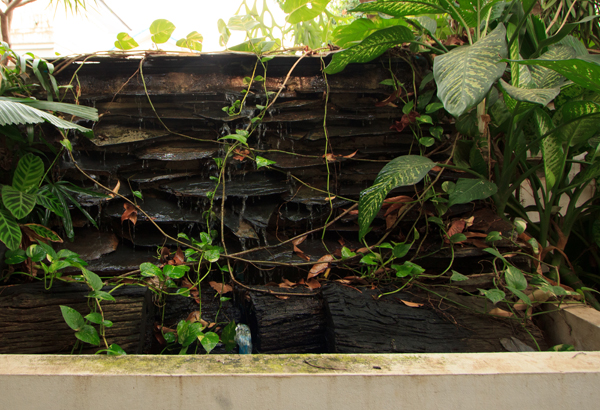 Fountains like this one and other water features such as reflecting pools can cool your home inexpensively.