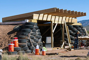 Foxhole Homes prototype tire bale earthship for veterans