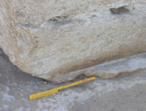 A ground level block in front of the Great Pyramid of Khufu includes an irregular lip at the bottom. This lip indicates that the block was cast in place.