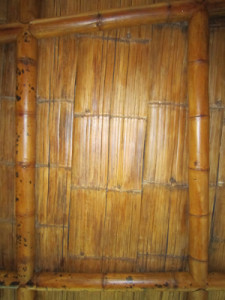 Golden bamboo sheets made by scoring and flattening bamboo.