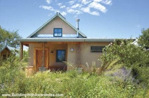 Hybrid home made with adobe and straw bales