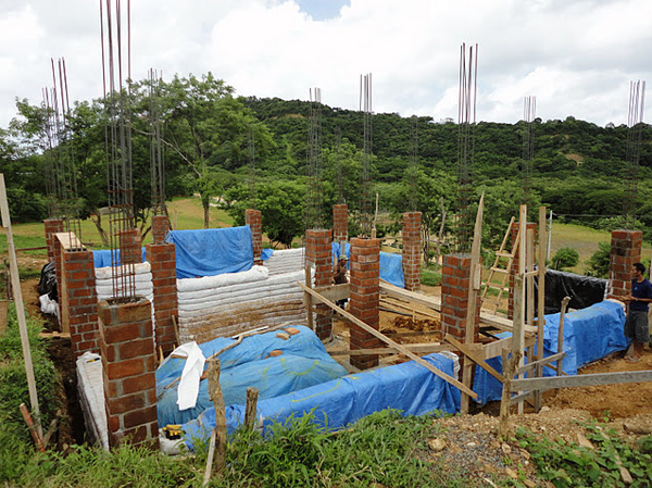 Hybrid home in the making (earthbag and masonry columns)