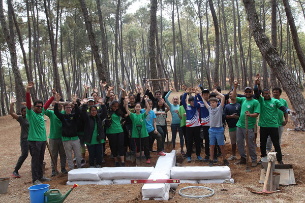 International students learning earthbag building in Nepal