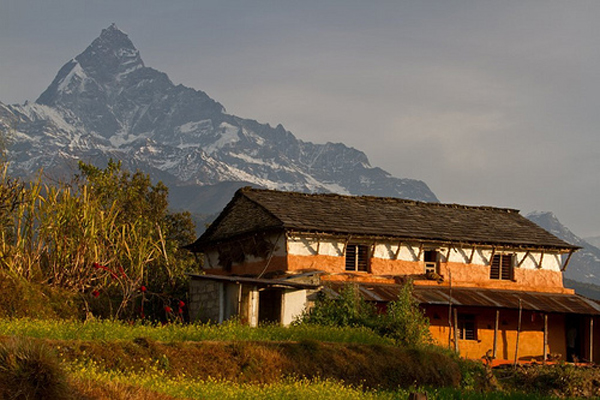 Traditional rural house in Nepal. Note the second story for storage of grains and other produce.