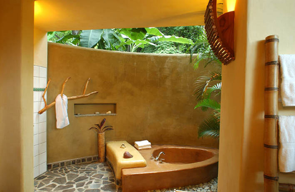 Open-air bathroom in luxury villa. You can actually do some star gazing from the sunken tub.