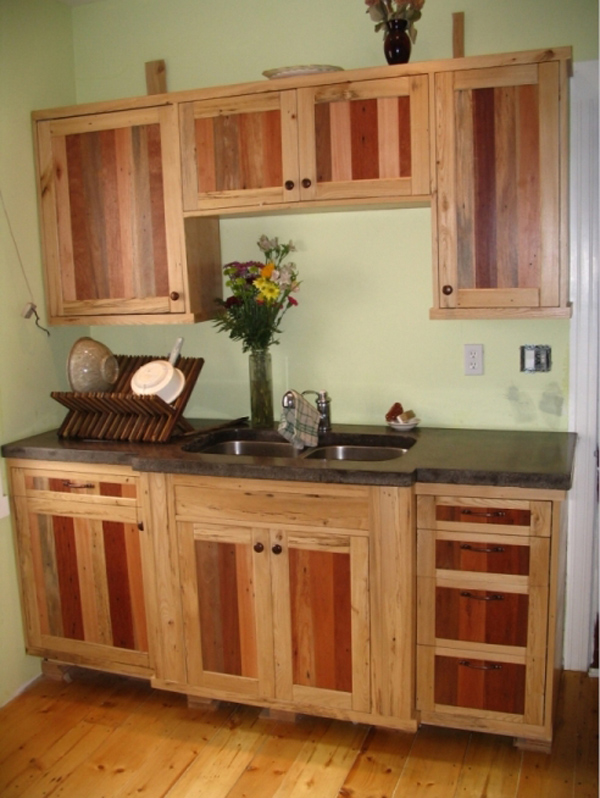 Kitchen cabinets made from reclaimed ash and tropical hardwood pallets for the panels (no stain)