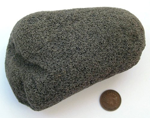 This piece of pumice drifted onto an Alaska beach, probably from an Aleutian volcano. It is as light as foam.