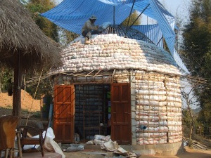 Dome roof on roundhouse made with bags of rice hulls