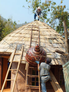 Bamboo roof on rice hull guesthouse in Thailand.