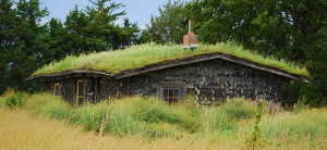 Grass on the roof, sod walls. Authentically-built sod house replica by Sod House.org. Tours are available.