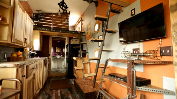 Modern-day features are scattered throughout this steampunk tiny home.
